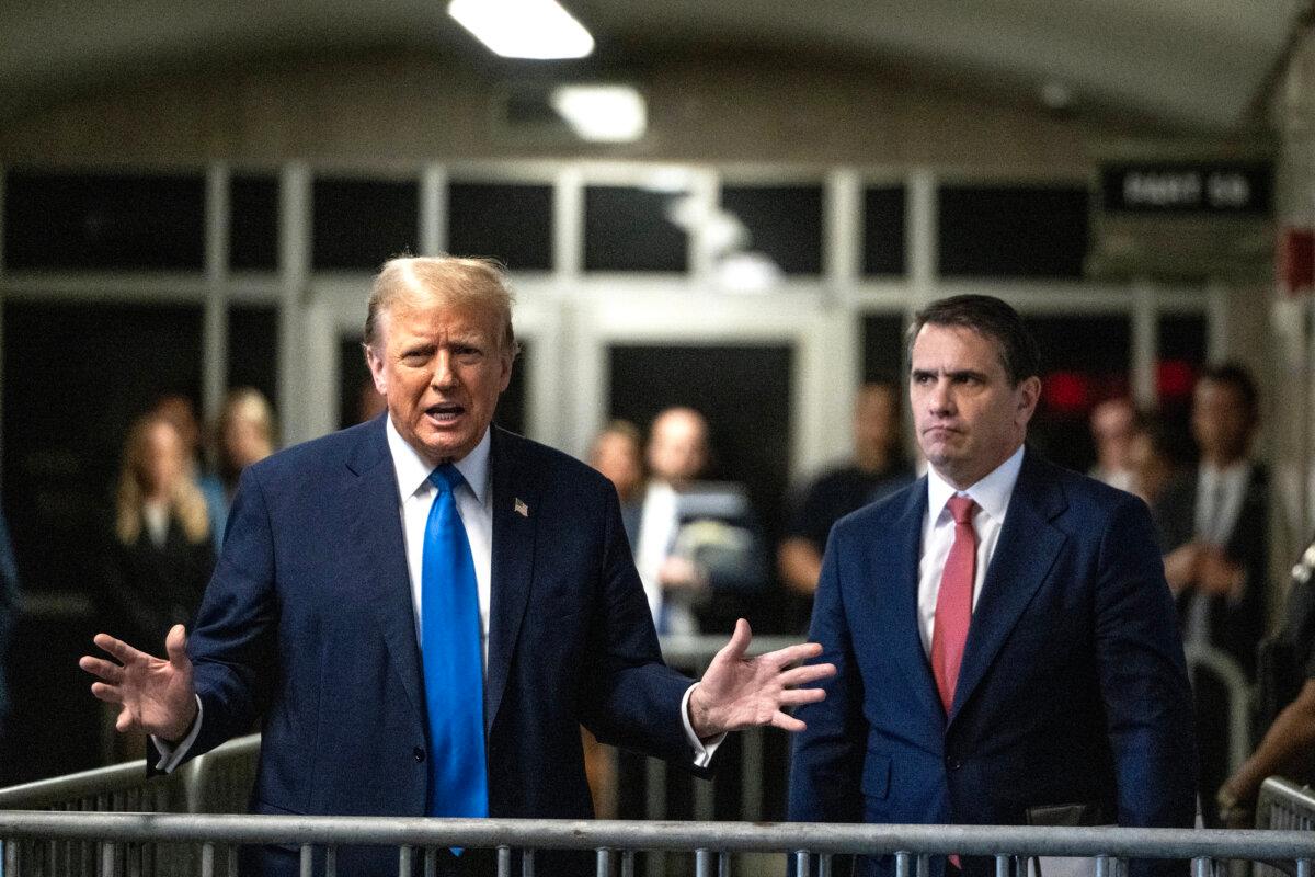 Former President Donald Trump speaks to the media as he leaves court with his attorney Todd Blanche during his trial for allegedly covering up hush money payments at Manhattan Criminal Court on April 22, 2024 in New York City. (Victor J. Blue-Pool/Getty Images)