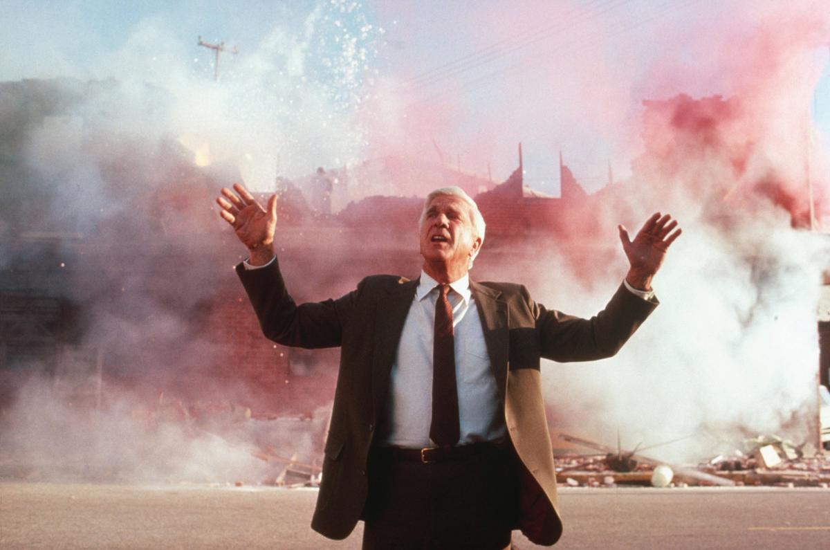The late comedic actor Leslie Nielsen played the protagonist, police detective Frank Drebin, throughout the original and subsequent sequels. (MovieStillsDB)