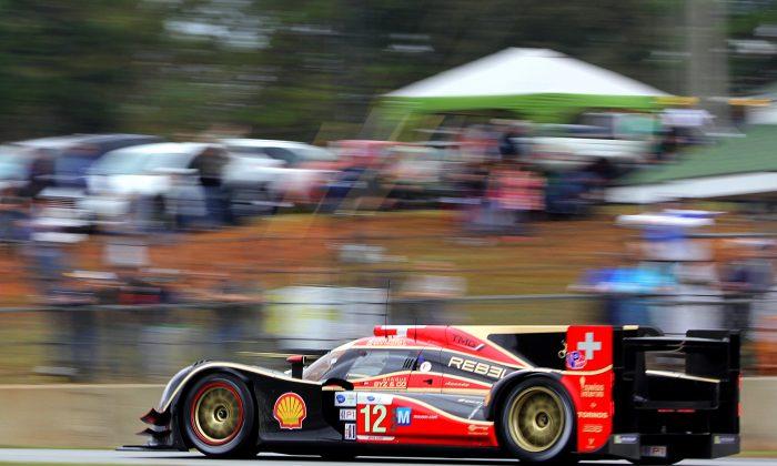 Rebellion Leads ALMS Petit Le Mans as Muscle Milk Pickett Racing Withdraws