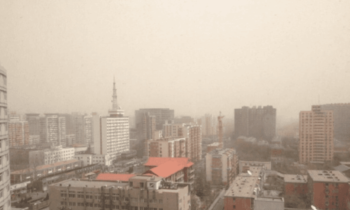 Sand Storm Hits Beijing, Pollution Data Breaks Record