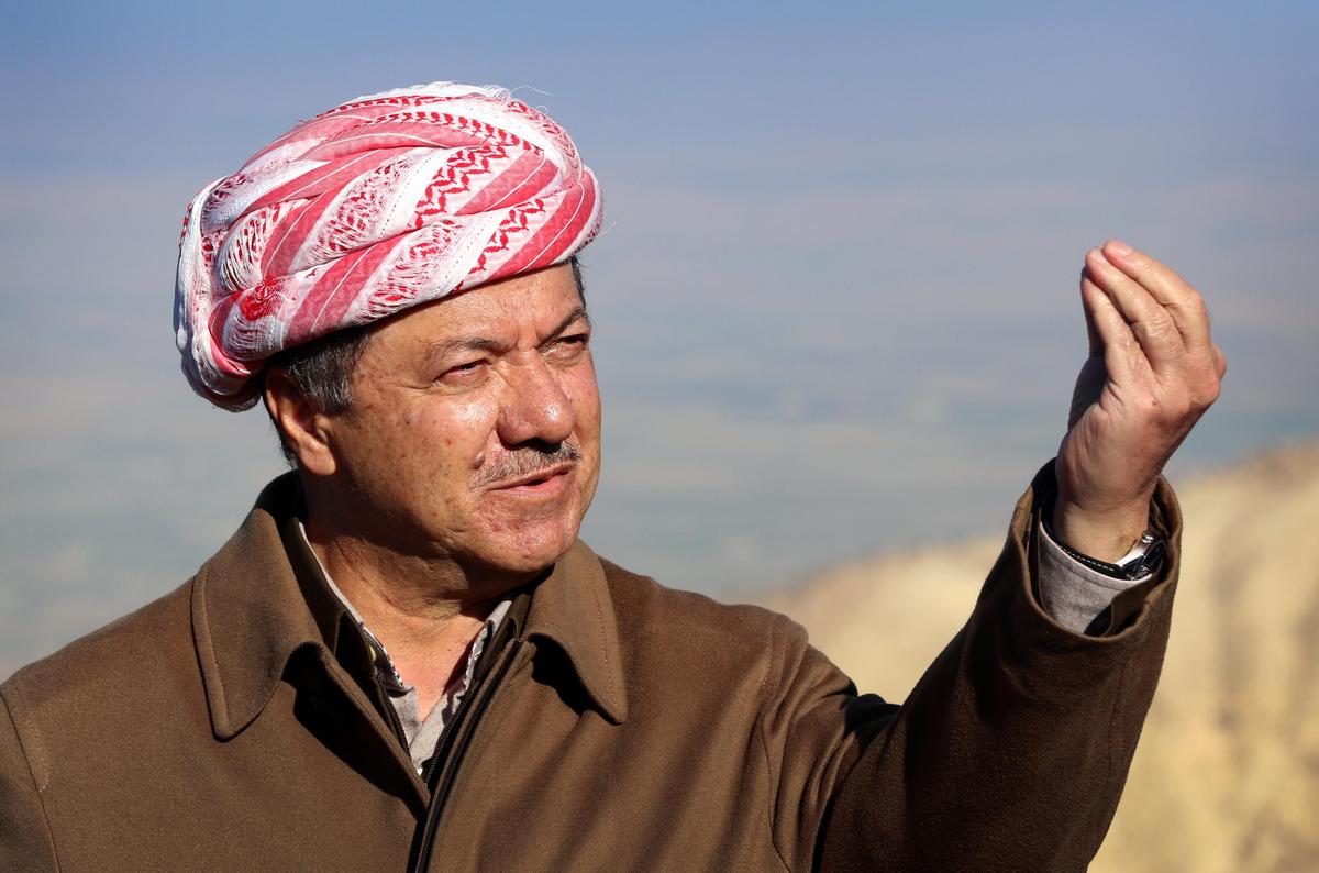 Iraqi Kurdish leader Masoud Barzani speaks to journalists on Dec. 21, 2014, during a visit to Mount Sinjar, west of the northern Iraqi city of Mosul. (Safin Hamed/AFP/Getty Images)