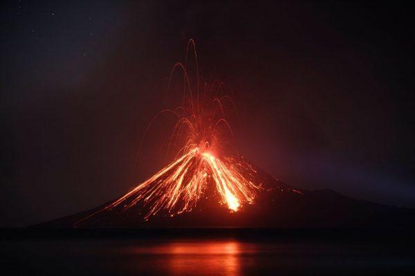 An Indonesian volcano called Anak Krakatau, known as the 'child' of the legendary Krakatoa, erupted on July 19, 2018, spewing a plume of ash high into the sky as molten lava streamed down from its summit. (Ferdi Awed/AFP/Getty Images)