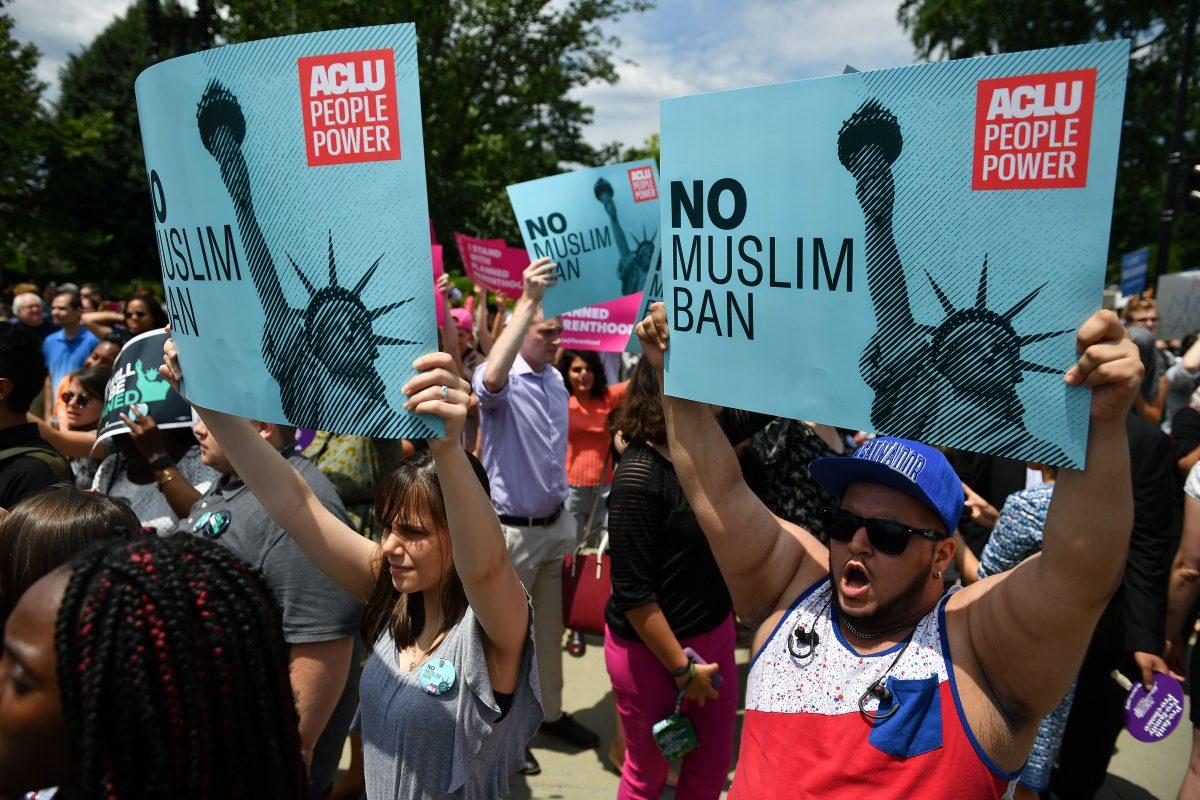 People protest the so-called Muslim travel ban in front of the Supreme Court in Washington on June 26, 2018. (MANDEL NGAN/AFP/Getty Images)