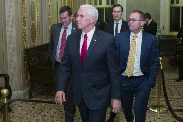 Vice President Mike Pence (second from L) with White House senior adviser Jared Kushner, and incoming White House Chief of Staff Mick Mulvaney leave for the night on Capitol Hill in Washington, on Dec. 21, 2018. (AP Photo/Alex Brandon)