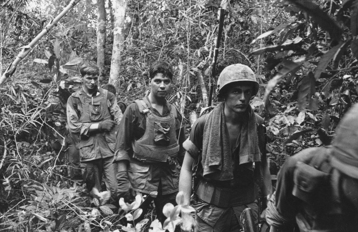U.S. Marines on patrol in a jungle during the Vietnam war on Nov. 4, 1968. (Photo by Terry Fincher/Express/Getty Images)