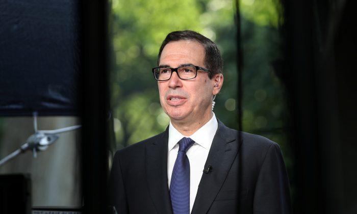 Mnuchin Says Huawei Case ‘Separate’ From US-China Trade Talks