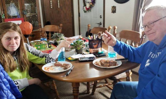 Jayme Closs, 13, and her grandfather Robert Naiberg enjoying a meal on Feb. 3, 2019. (Light the way home for Jayme/Facebook)