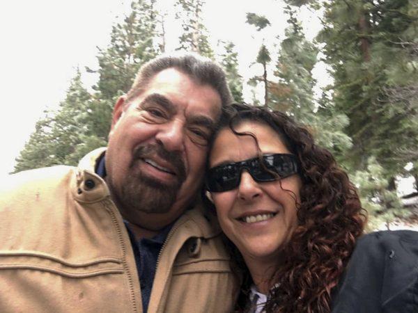 Selfie by Julia Ackley shows herself and her father, Antonio Pastini, at Lake Tahoe near Carson City, Nev. Pastini, who had also gone by Jordan Isaacson and was known for years as Ike, was killed while piloting a small plane that crashed into a house in Yorba Linda, Calif., on Feb. 3, 2019. (Julia Ackley via AP, File)