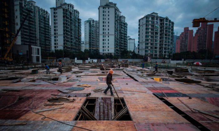 Chinese Real Estate Firms Drowning in Debt