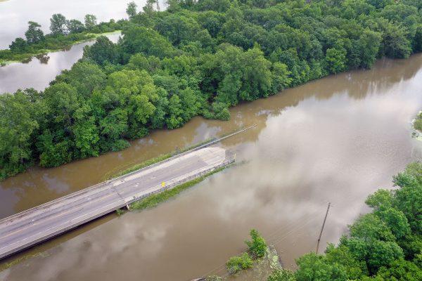 State Highway 3 is swallowed up by flood water where the Marys River meets the Mississippi River at Chester, Ill., on May 30, 2019. (Scott Olson/Getty Images)