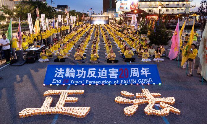 Candlelight Illuminates the Memory of Lives Lost During 20-Year Persecution in China