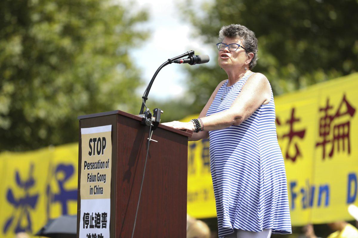 Faith McDonnell, director for religious liberty programs at<br/>Institute on Religion and Democracy, speaks at a rally commemorating the 20th anniversary of the persecution of Falun Gong in China, on the West lawn of Capitol Hill in Washington on July 18, 2019. (Samira Bouaou/The Epoch Times)