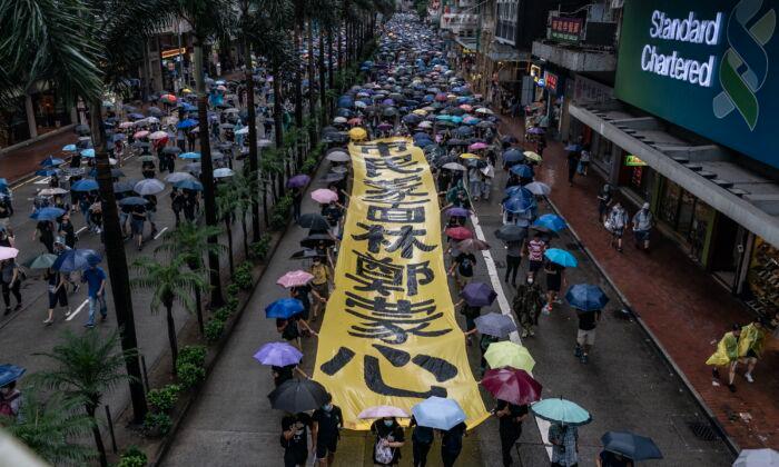 Hong Kong Protesters Defy Mask Ban to March in 18th Straight Weekend of Demonstrations