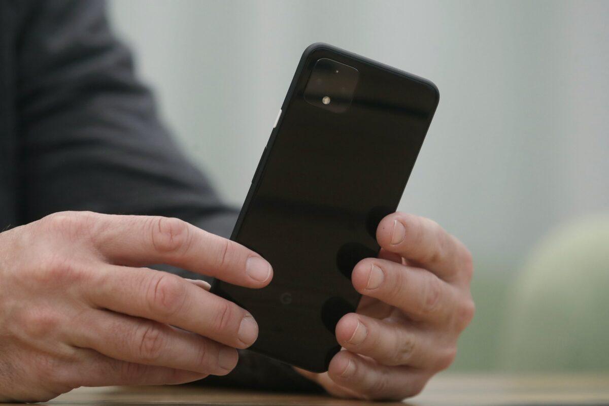 Rick Osterloh, SVP of Google Hardware holds a new Pixel 4 phone during an interview in Mountain View, Calif., on Sept. 24, 2019. (Jeff Chiu/AP Photo)