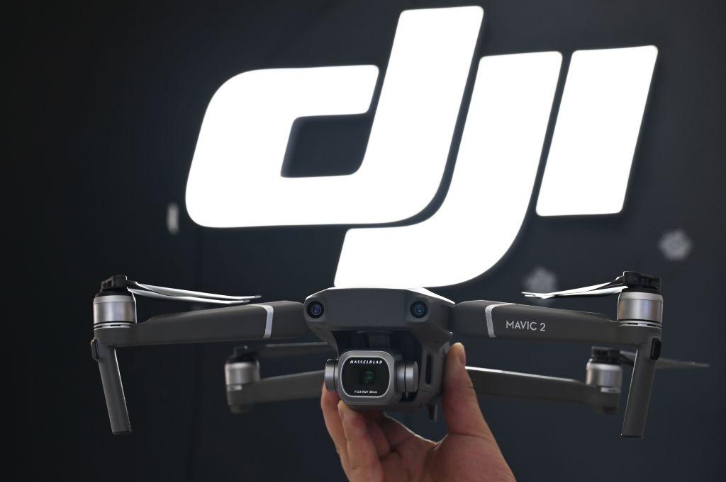 An employee shows the new Mavic Pro 2 drone in a DJI store in Shanghai on May 22, 2019. (Hector Retamal/AFP/Getty Images)