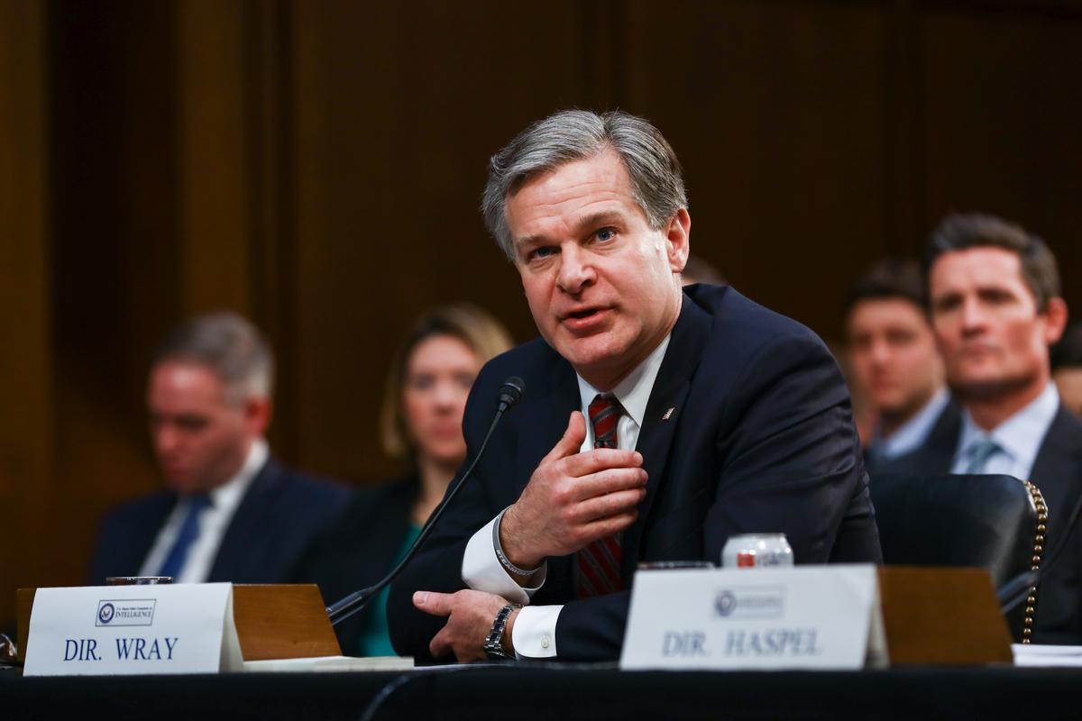 FBI Director Christopher Wray testifies at a hearing in front of the Senate Intelligence Committee in Congress in Washington on Jan. 29, 2019. (Charlotte Cuthbertson/The Epoch Times)