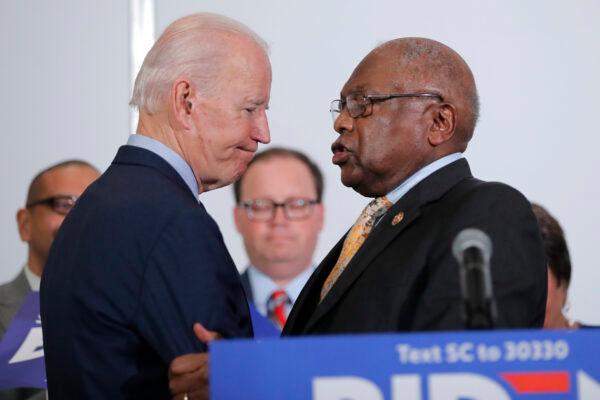 House Majority Whip James Clyburn (D-S.C.) greets Democratic presidential candidate and former Vice President Joe Biden at the National Action Network South Carolina Ministers' Breakfast in North Charleston, S.C., on Feb. 26, 2020. (Gerald Herbert/AP Photo)
