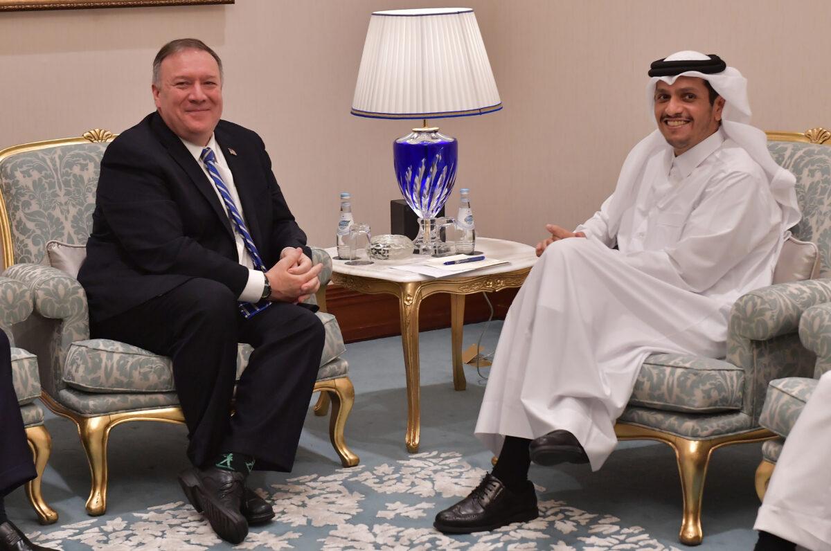 Qatari Deputy Prime Minister and Minister of Foreign Affairs Sheikh Mohammed bin Abdulrahman al-Thani (R) meets with U.S. Secretary of State Mike Pompeo on the sidelines of the peace signing ceremony between the United States and the Taliban in the Qatari capital Doha on February 29, 2020. (Giuseppe Cacace / AFP)