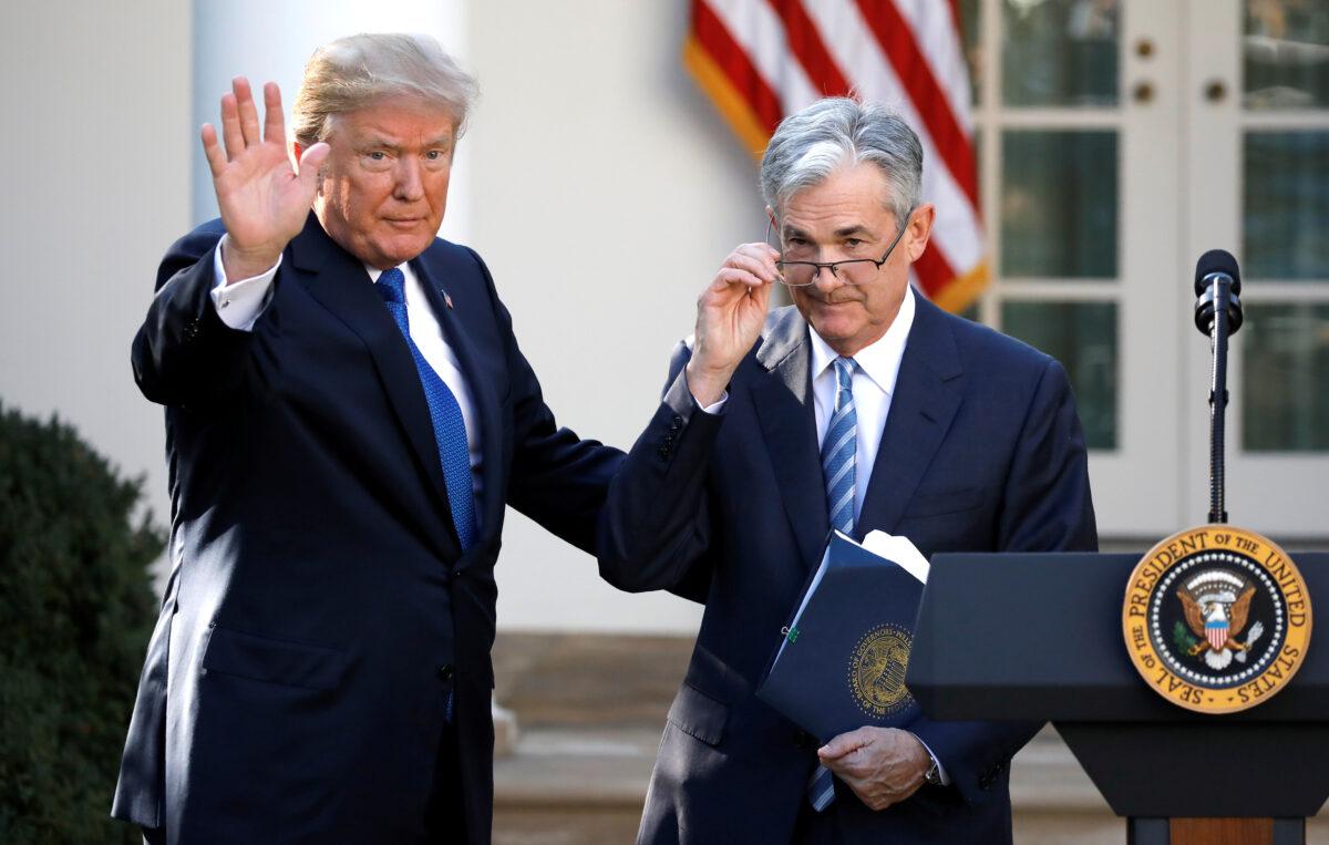 President Donald Trump gestures with then-nominee for Federal Reserve Chairman Jerome Powell, at the White House in Washington, on Nov. 2, 2017. (Carlos Barria/Reuters)