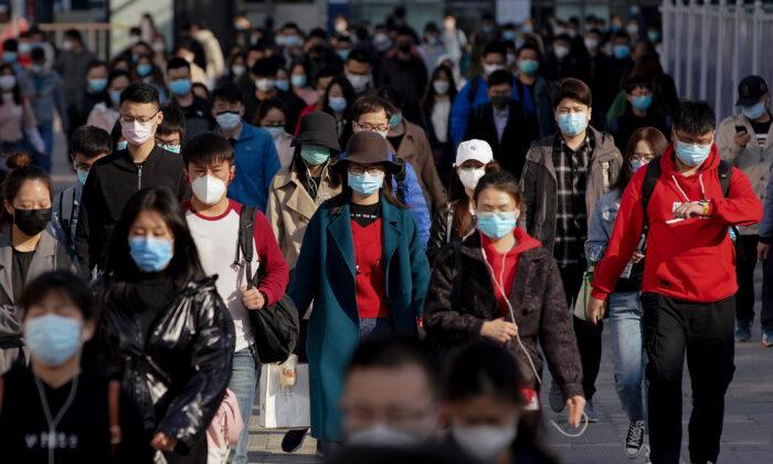Fears Mount of Second Wave of Virus Infections as China Begins to Lift Restrictions