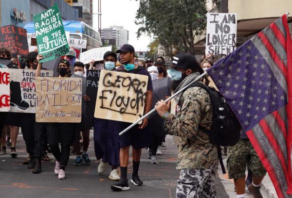 Demonstrators participate in a protest in Miami, Fla., on June 12, 2020. (Joe Raedle/Getty Images)
