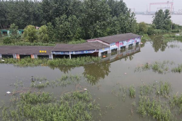 A building is inundated by flood in Zhenjiang, China on July 20, 2020. (STR/AFP via Getty Images)