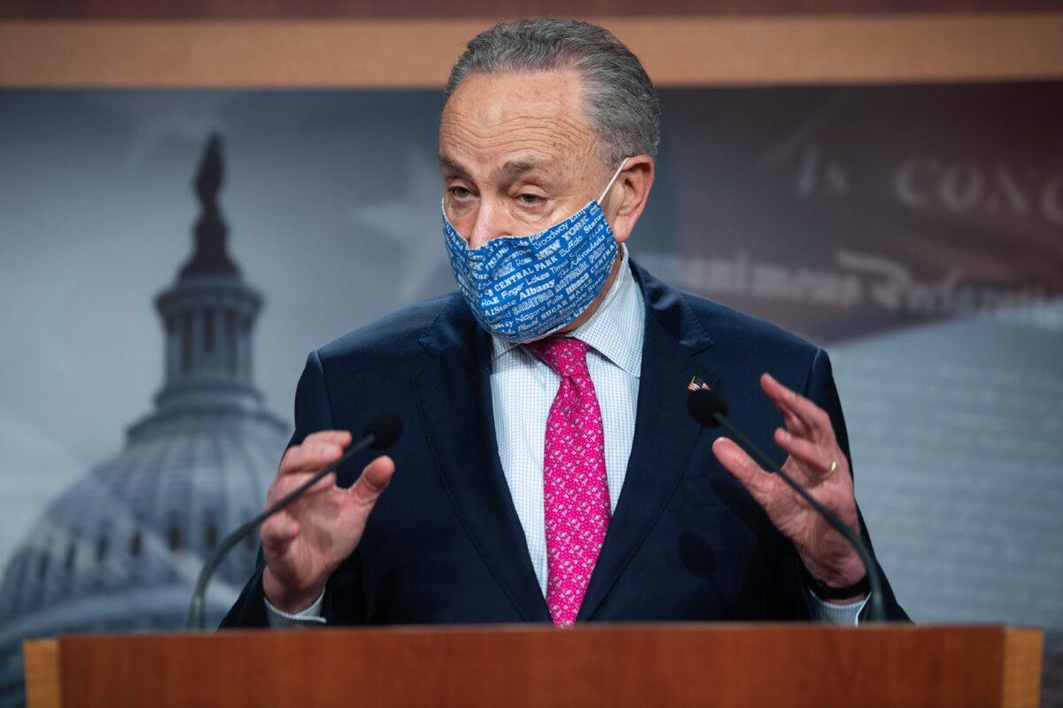 Senate Majority Leader Chuck Schumer (D-N.Y.) talks to reporters during a press conference in Washington on Jan. 26, 2021. (Saul Loeb/AFP via Getty Images)