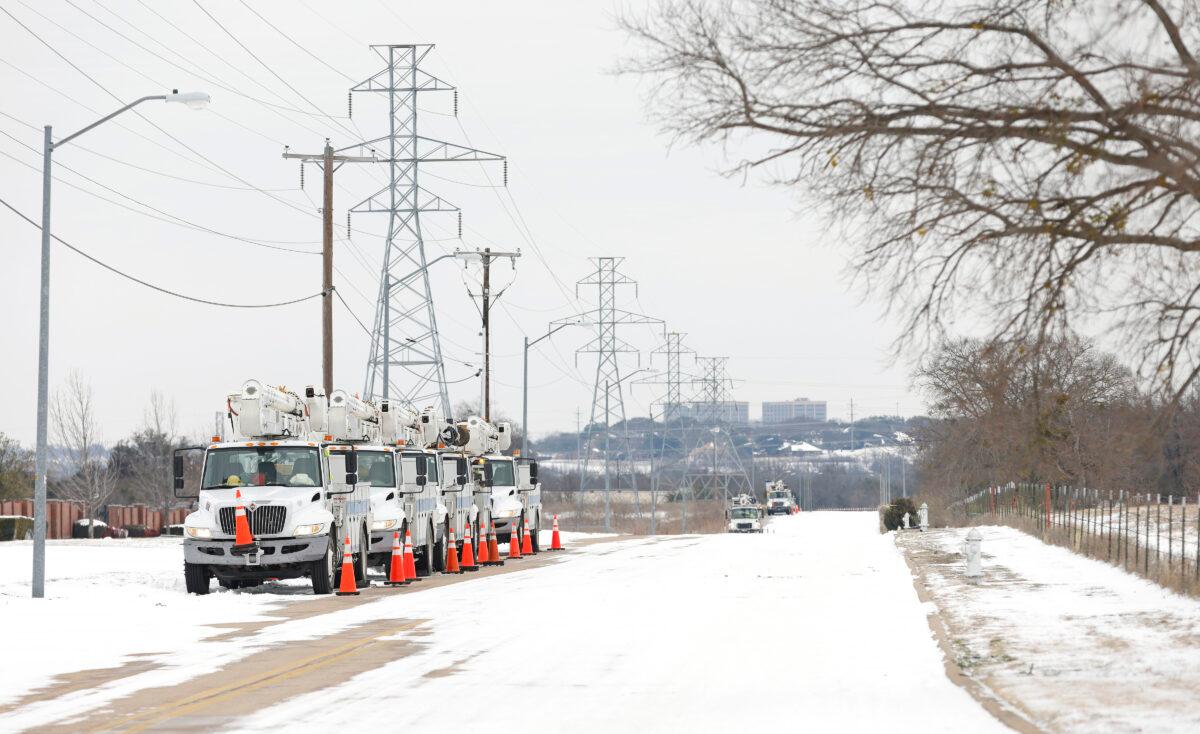 Pike Electric service trucks line up after a snow storm in Fort Worth, Texas on Feb. 16, 2021. (Ron Jenkins/Getty Images)