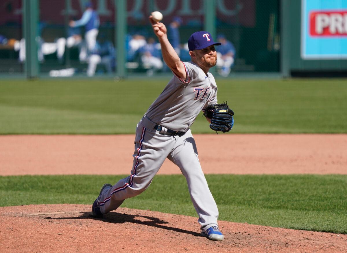 Ian Kennedy of the Texas Rangers throws in the ninth inning against the Kansas City Royals at Kauffman Stadium in Kansas City, Mo., on April 4, 2021. (Ed Zurga/Getty Images)