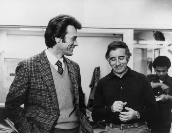 Actor-directors Clint Eastwood (L) and Don Siegel talking on the set of "Dirty Harry," circa 1971. (Hulton Archive/Getty Images)