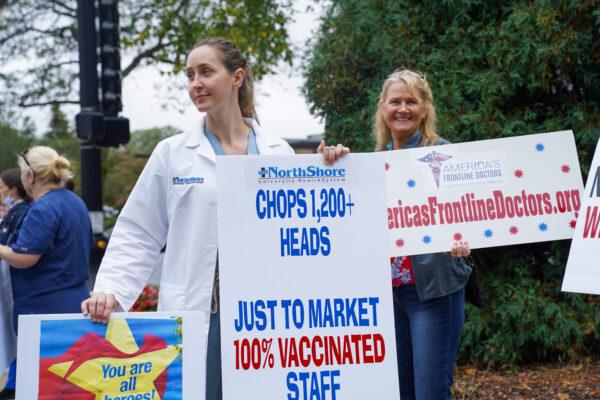 Lauren Gioia stands in a protest against NorthShore University HealthSystem's vaccine mandate outside Evanston Hospital in Evanston, Ill., on Oct. 12, 2021. (Cara Ding/The Epoch Times)