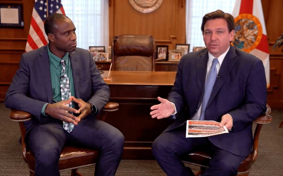 Florida Surgeon General Joseph Ladapo (L) and Florida Gov. Ron DeSantis (R) at the governor's office in Tallahassee on Feb. 24, 2022, in a still from video. (Florida Governor's Office/Screenshot via The Epoch Times)