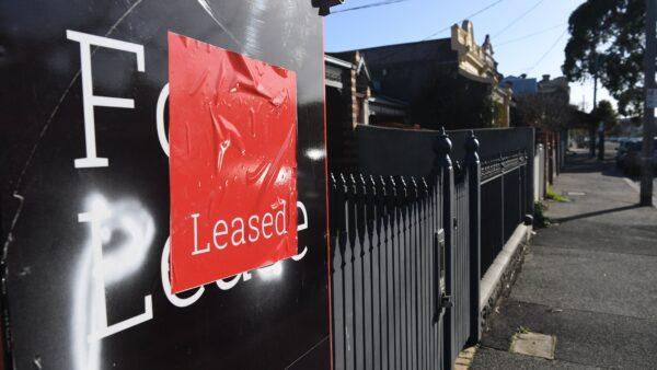 Signage for a real estate property is seen in Carlton North, Melbourne, Australia, on July 18, 2018. (AAP Image/James Ross)