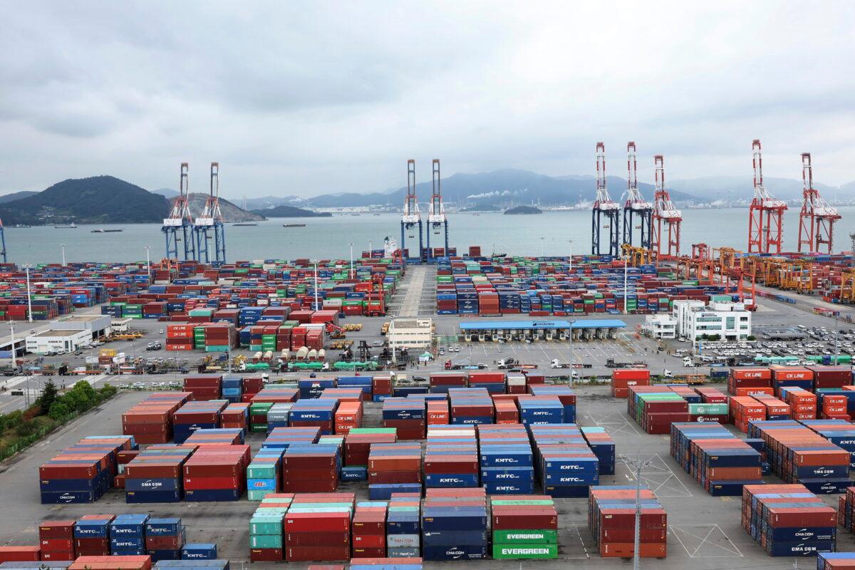 Stacked containers line a shipping port in Gwangyang, South Korea, on June 14, 2022. (Kim Dong-ju/AP Photo)