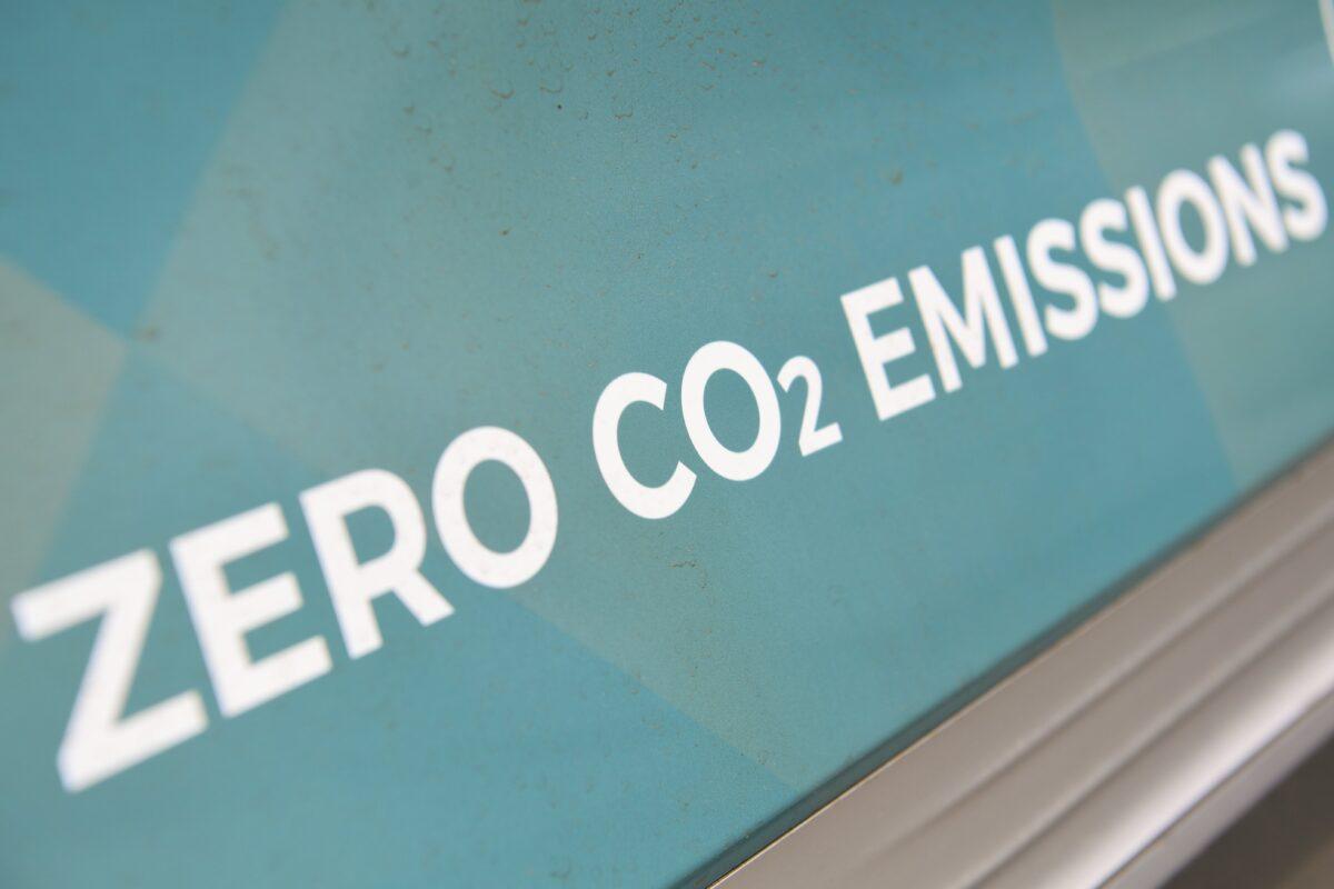 The slogan "Zero CO2 Emissions" is seen on a Hyundai Nexo hydrogen vehicle at a hydrogen refueling station in Canberra, Australia, on Feb. 4, 2022. (AAP Image/Lukas Coch)
