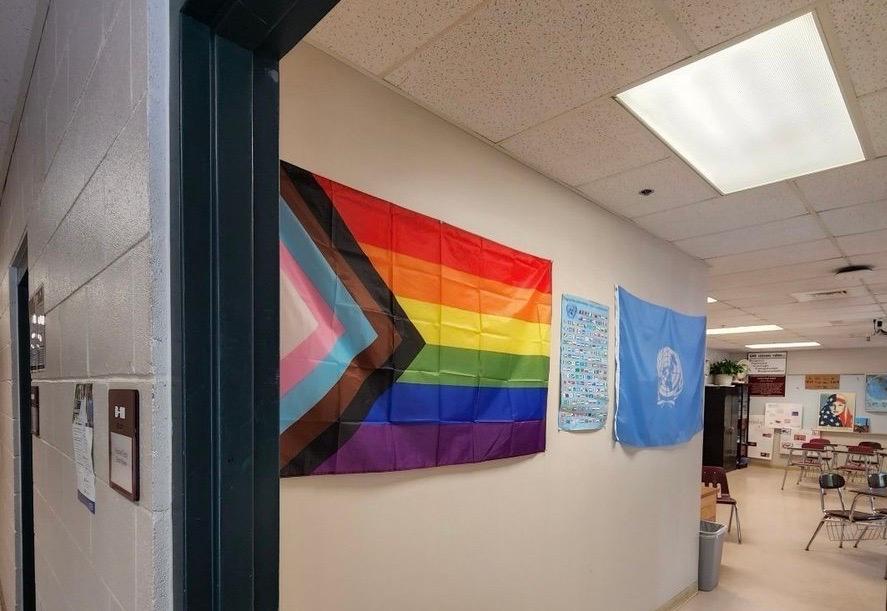 Many schools across America now display LGBT flags and other political symbols in the classroom, like this one, photographed during the 2022 school year by a student inside Gorham High School in Gorham, Maine. (Courtesy of HB, a student interviewed and kept anonymous by The Epoch Times)