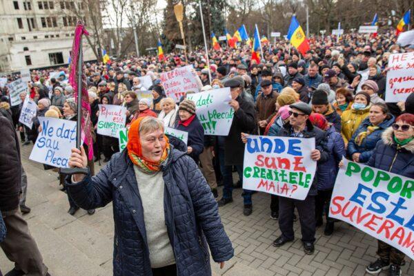 People take part in a protest against the Moldovan government and their pro-EU president in Chisinau, Moldova, on Feb. 19, 2023.  (Elena Covalenco/AFP via Getty Images)