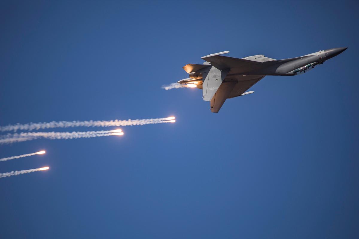 This photo taken on Oct. 17, 2019 shows a J-16 fighter jet performing in the sky during the Chinese People's Liberation Army Air Force Aviation Open Day in Changchun in China's northeastern Jilin province. (STR/AFP via Getty Images)