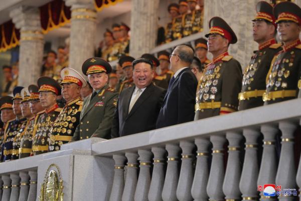 North Korean leader Kim Jong Un, Chinese Communist Party politburo member Li Hongzhong, and Russia's Defense Minister Sergei Shoigu attend a military parade to commemorate the 70th anniversary of the Korean War armistice in Pyongyang, North Korea, on July 27, 2023. (KCNA via Reuters)