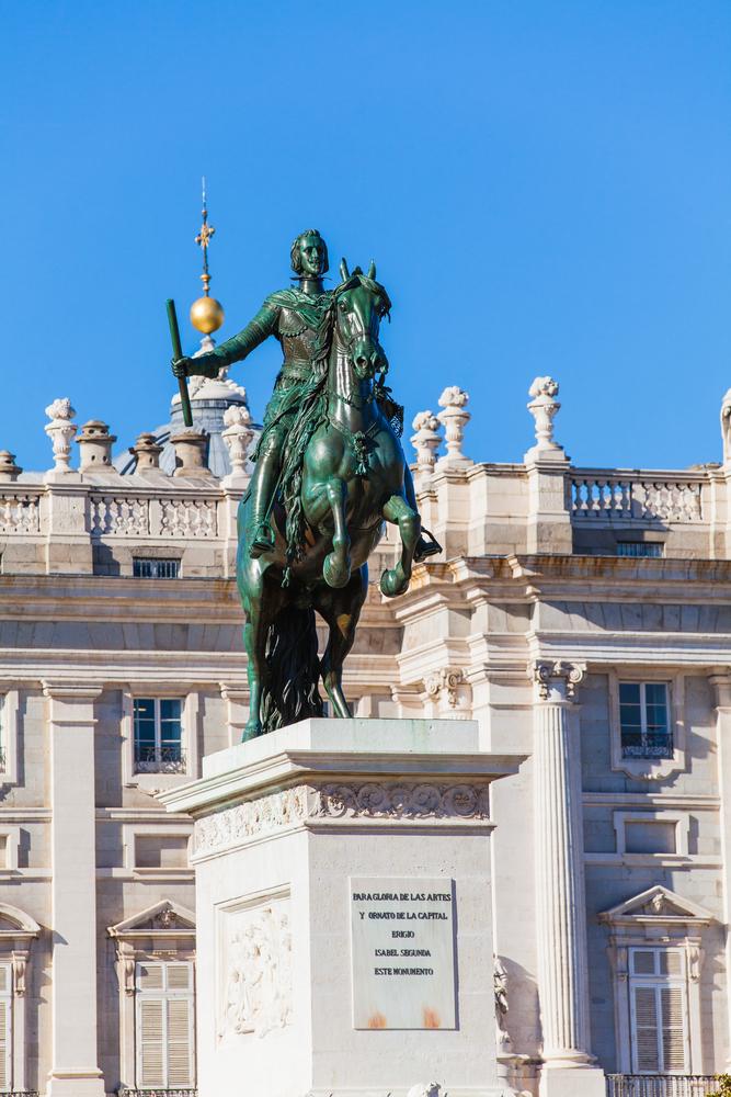A statue of King Felipe IV stands at the center of the Plaza de Oriente in Madrid. (David MG/Shutterstock)