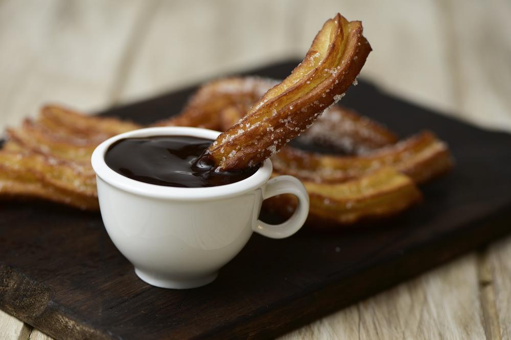 Churros con chocolate are a typical Spanish sweet snack. (nito/Shutterstock)