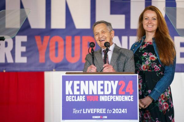 Dennis Kucinich, campaign manager for presidential candidate Robert F. Kennedy Jr., along with his wife Elizabeth, speaks at a press conference in Philadelphia on Oct. 9, 2023. (Jessica Kourkounis/Getty Images)