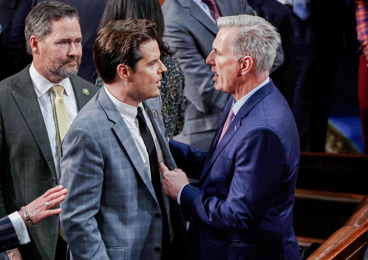 House Republican leader Kevin McCarthy (R-Calif.) (R) talks to Rep.-elect Matt Gaetz (R-Fla.) in the House Chamber during the fourth day of voting for speaker of the House at the U.S. Capitol in Washington on Jan. 6, 2023. (Photo by Chip Somodevilla/Getty Images)