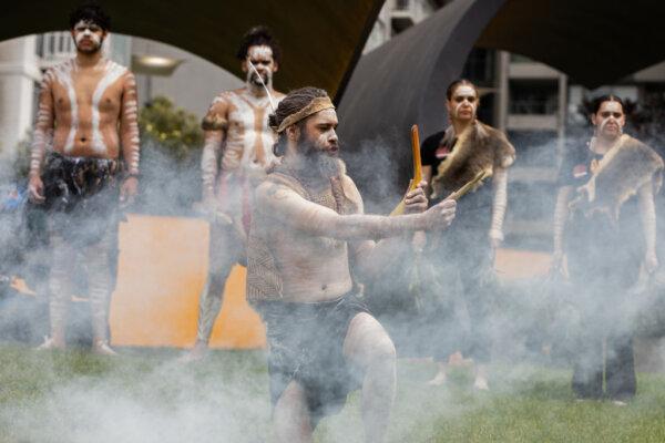 Indigenous performers perform the Welcome to Country during a smoke ceremony prior to the state funeral service for Uncle Jack Charles at Hamer Hall in Melbourne, Australia, on Oct. 18, 2022. (Asanka Ratnayake/Getty Images)