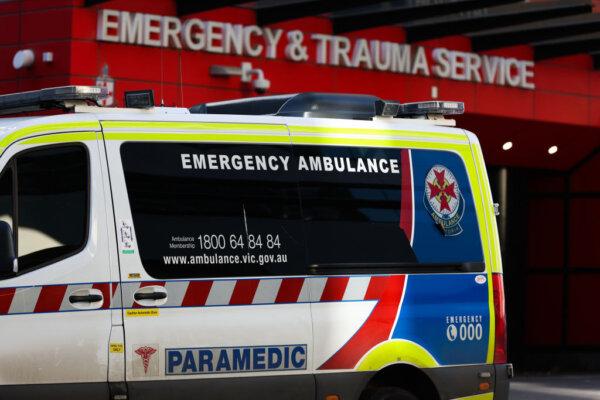 An ambulance is parked in front of the Emergency and Trauma service at the Royal Melbourne Hospital in Melbourne, Australia, on July 21, 2022. (Asanka Ratnayake/Getty Images)
