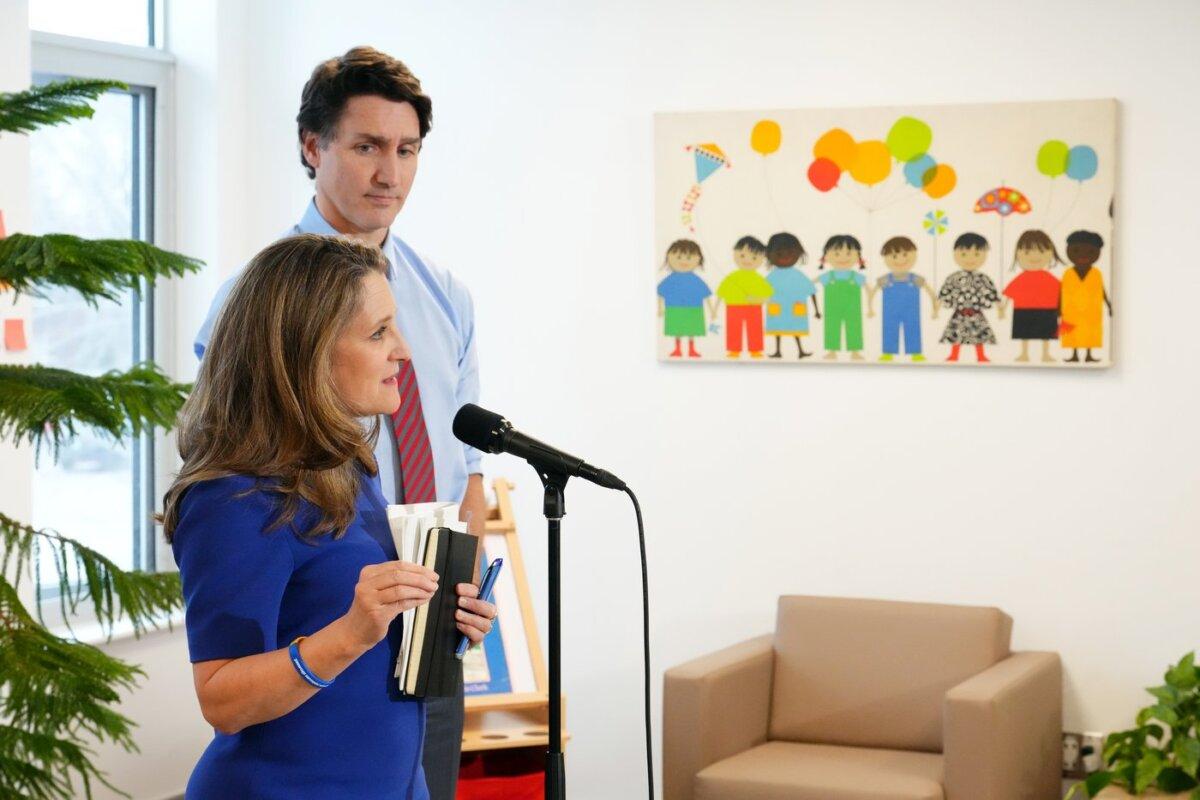 Prime Minister Justin Trudeau looks on as Deputy Prime Minister and Minister of Finance Chrystia Freeland speaks at a press conference at a local child-care centre in Ottawa, on March 29, 2023. (The Canadian Press/Sean Kilpatrick)