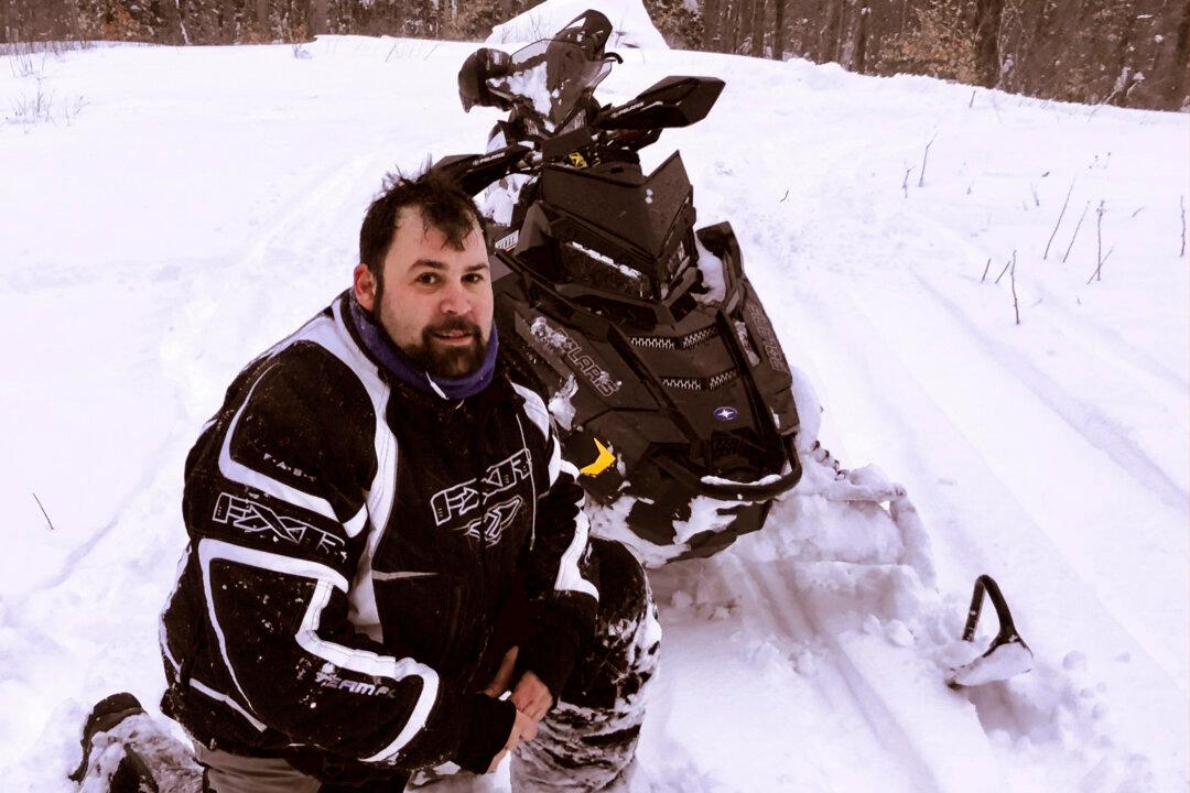 Man Who Crashed Snowmobile Into Parked Black Hawk Helicopter Is Suing Government for $9.5 Million