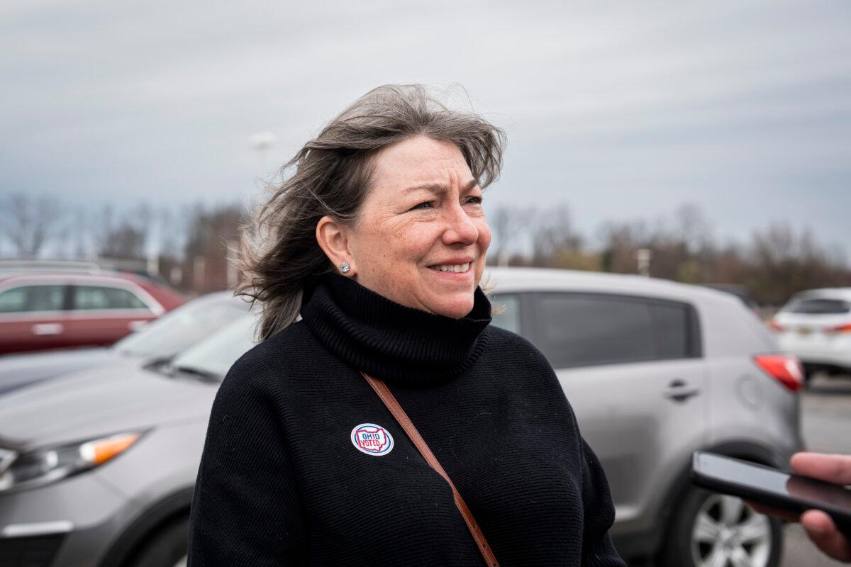 Terry Carney speaks with The Epoch Times after casting her vote at a polling place in Avon, Ohio, on March 19, 2024. (Madalina Vasiliu/The Epoch Times)