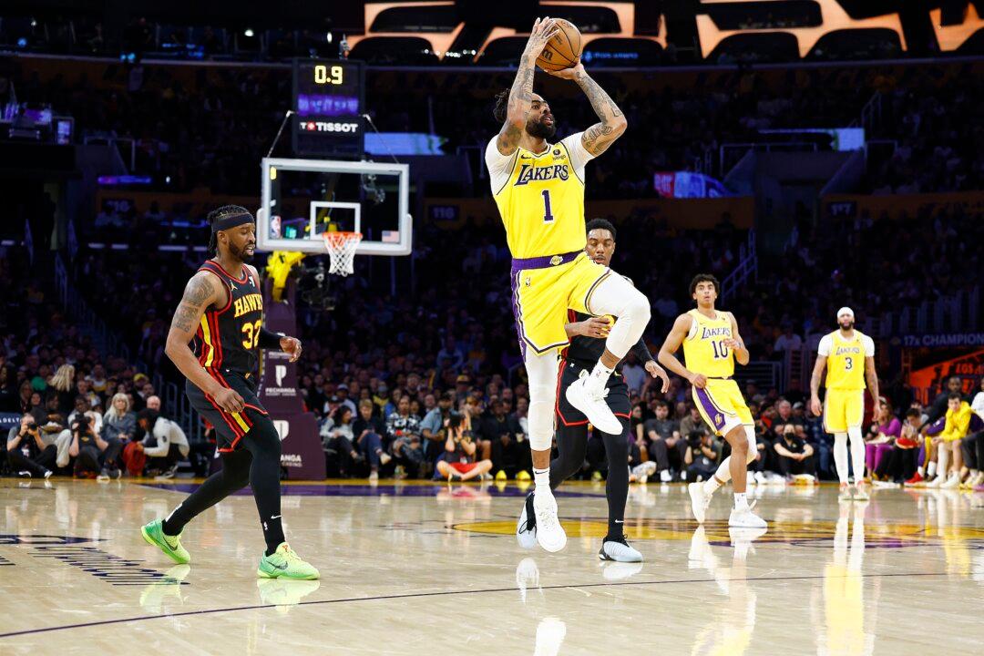 James, Russell Lead Lakers to Big Win Over Visiting Hawks