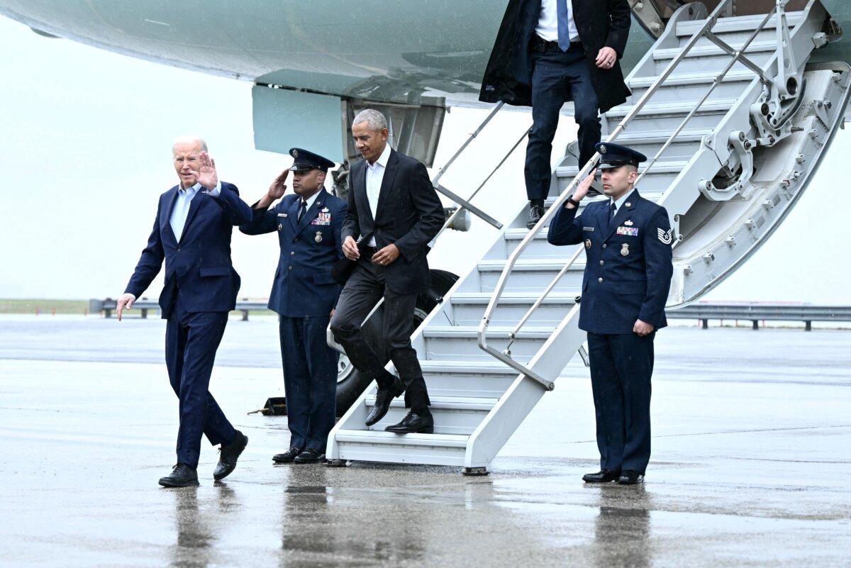 President Joe Biden (L) and former President Barack Obama step off Air Force One upon arrival at John F. Kennedy International Airport in the Queens borough of New York City on March 28, 2024. (Brendan Smialowski/AFP via Getty Images)